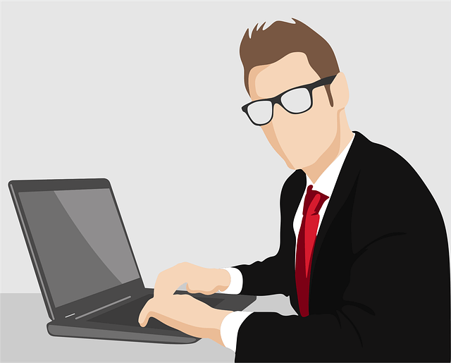 Focused businessman working on a laptop illustrating self-acceptance and conscious action for career success